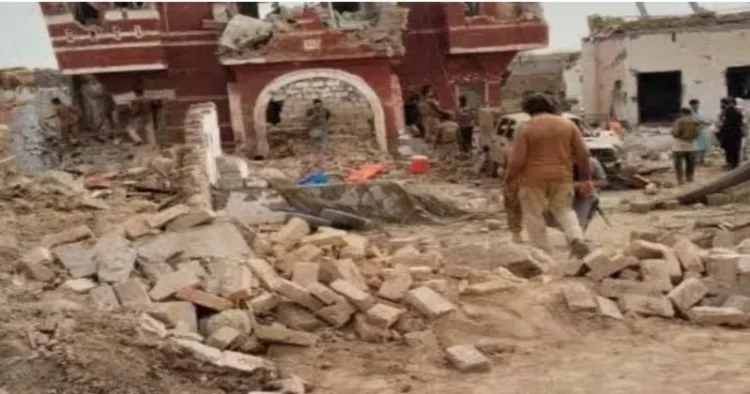 Security forces secure the site after a suicide attack in in Tank district