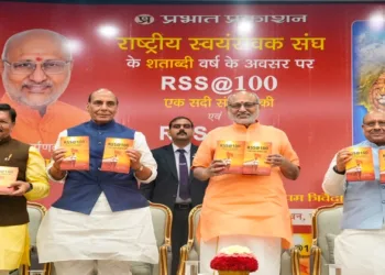Vice President CP Radhakrishnan along with Union Defence Minister Rajnath Singh at the release of the book ‘RSS @ 100: A Century of Service, Unity & Sacrifice’