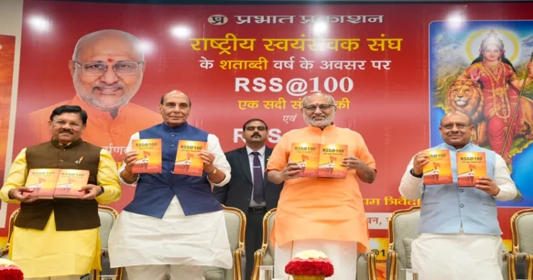 Vice President CP Radhakrishnan along with Union Defence Minister Rajnath Singh at the release of the book ‘RSS @ 100: A Century of Service, Unity & Sacrifice’