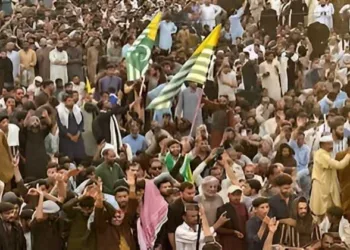Supporters of the Joint Awami Action Committee (JAAC) gather as they shout slogans during a week-long protest in Rawalakot