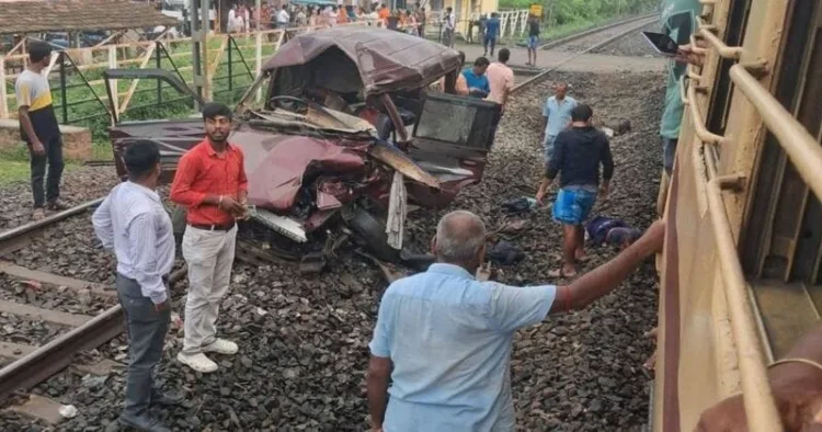 Train collides with school van at railway crossing, three students killed
