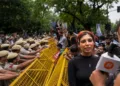 At the CJP protest a woman threatens to kill PM Modi