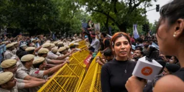At the CJP protest a woman threatens to kill PM Modi