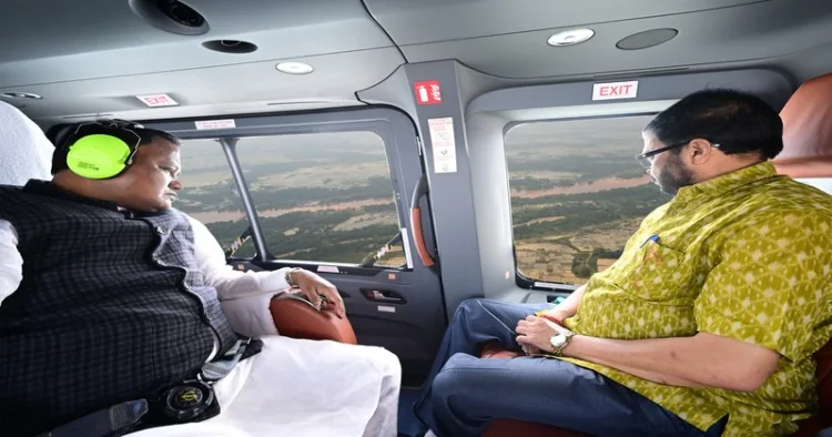 - Chief Minister Mohan Charan Majhi and Revenue Minister Suresh Pujari making an aerial survey of flood affected areas on 1 August 2026