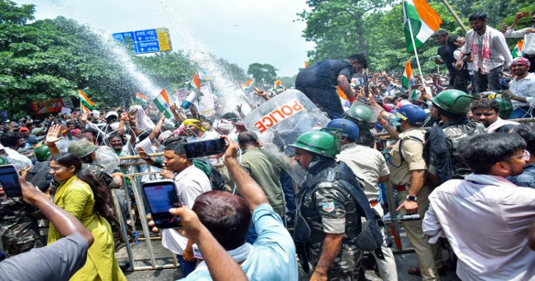 Ranchi, Aug 10 (ANI): Police use water cannons at protesters during students' march towards Jharkhand Assembly to protest against the government over alleged JPSC and JSSC-CGL examination paper leak, in Ranchi on Monday. (ANI Photo)