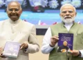 New Delhi, Aug 12 (ANI): Prime Minister Narendra Modi and former President Ram Nath Kovind during the release of Kovind's autobiography titled "Triumph of the Indian Republic: My Life, My Struggles", in New Delhi on Wednesday. (DPR PMO/ANI Photo)