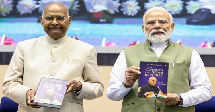 New Delhi, Aug 12 (ANI): Prime Minister Narendra Modi and former President Ram Nath Kovind during the release of Kovind's autobiography titled "Triumph of the Indian Republic: My Life, My Struggles", in New Delhi on Wednesday. (DPR PMO/ANI Photo)