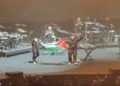 British band Massive Attack displaying Palestinian flag at a concert in Singapore