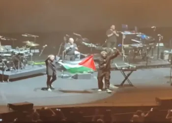 British band Massive Attack displaying Palestinian flag at a concert in Singapore