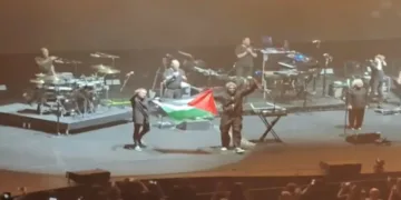 British band Massive Attack displaying Palestinian flag at a concert in Singapore