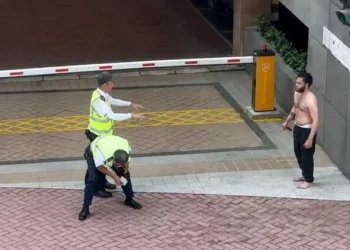 Bangladeshi migrant Khan confronts security guards during the knife attack at Baguio Villa in Hong Kong