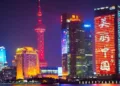 A night view of the Bund with the Oriental Pearl TV Tower and other skyscrapers in Pudong, Shanghai, China