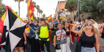 Ceuta residents wave Spanish flags and march through the streets during protests over the continuing migrant crisis in Spain’s North African enclave.