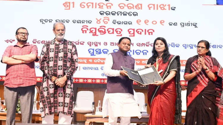 CM Mohan Charan Majhi presents appointment letters at the 17th Recruitment Fair held at the Agricultural Education Sadan on the OUAT campus in Bhubaneswar.