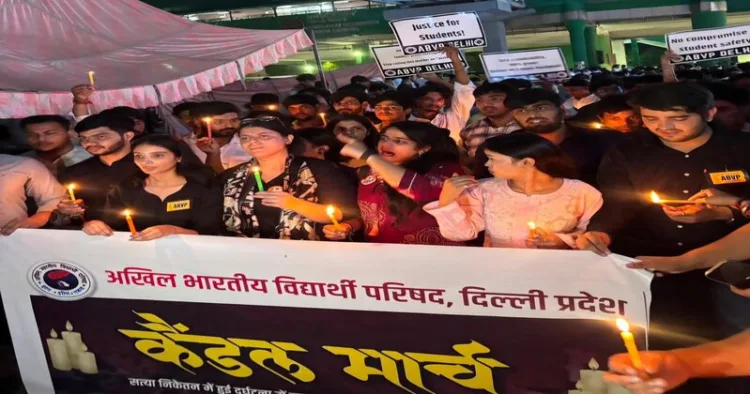 ABVP takes out candle march to pay tribute to the students who lost their lives in the Satya Niketan building collapse