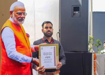 A qualified candidate poses for photos with a cutout of Prime Minister Narendra Modi after receiving his appointment letter (Old image from 2022 used for representative purposes)