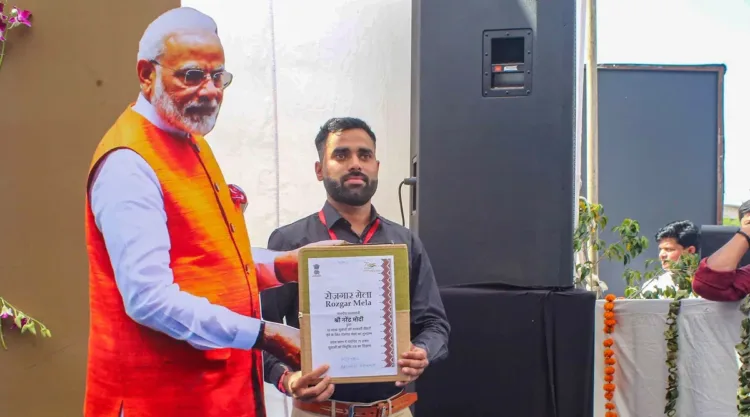 A qualified candidate poses for photos with a cutout of Prime Minister Narendra Modi after receiving his appointment letter (Old image from 2022 used for representative purposes)