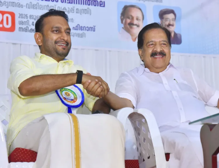 P.K. Firos, IUML leader and MLA with Ramesh Chennithala, Home Minister of Keralam