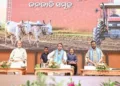 Odisha CM Mohan Charan Majhi and others during the CM-KISAN Rabi 2026-27 fifth instalment assistance distribution programme at Krushi Shiksha Sadan OUAT