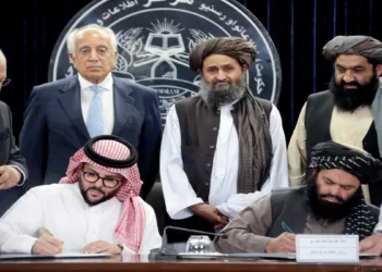 Taliban's Mines and Petroleum Minister Hedayatullah Badri and Delta CEO Shaher Al-Taqi sign an exploration agreement in the presence of Zalmay Khalilzad, former US special representative for Afghanistan, in Kabul on Sept. 7, 2026