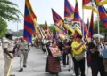 Members of the Tibetan community take part in a protest march against Chinese President Xi Jinping’s visit to India in New Delhi on September 11