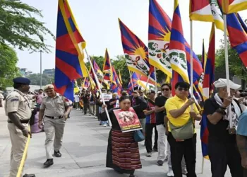 Members of the Tibetan community take part in a protest march against Chinese President Xi Jinping’s visit to India in New Delhi on September 11