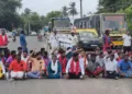 Parents and protesters stage a road blockade in Athur, Thoothukudi district, demanding action against a school headmaster over the alleged removal of sacred malas worn by Hindu students.