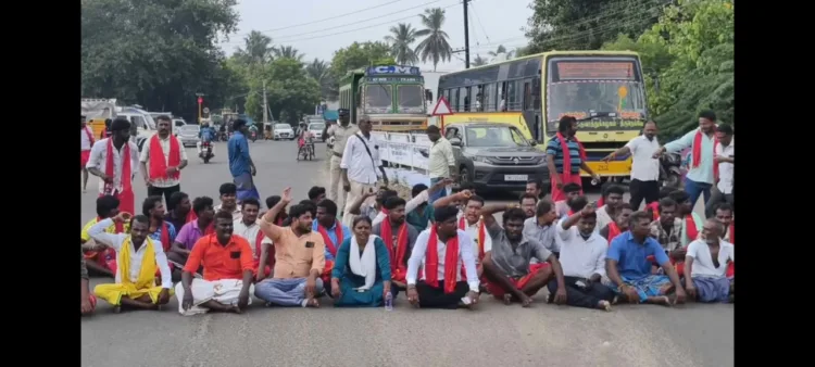 Parents and protesters stage a road blockade in Athur, Thoothukudi district, demanding action against a school headmaster over the alleged removal of sacred malas worn by Hindu students.