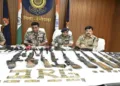 Police and security forces officials briefing the media on the recovery of a Maoist weapons and explosives dump in Dantewada.