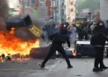 Protesters clash with police amid burning barricades and street fires during escalating unrest in France