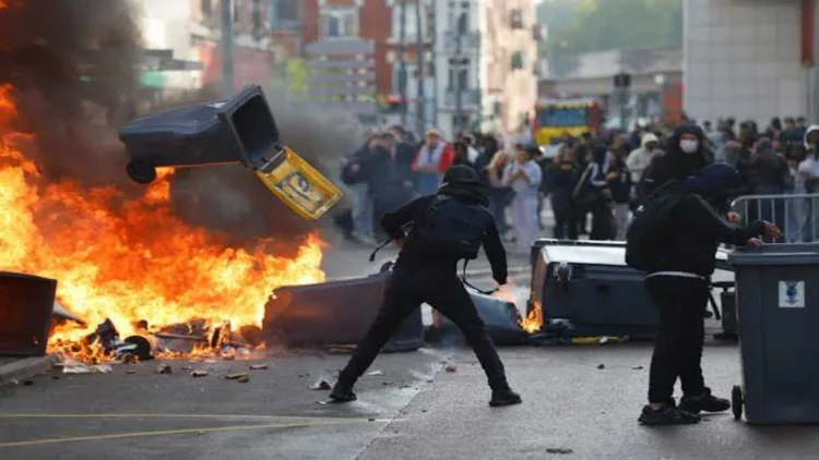 Protesters clash with police amid burning barricades and street fires during escalating unrest in France