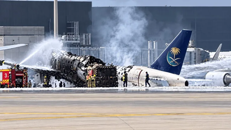 A Saudi Arabian Airlines aircraft burns at Riyadh airport following a Houthi missile attack, amid escalating strikes on Saudi infrastructure