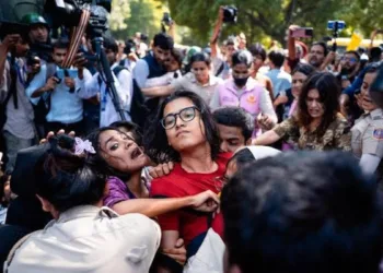 AISA leader Neha Bora has come under the spotlight over claims of calling for women who disagreed with her to be stripped naked and paraded